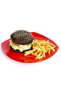 Dessert in plate against white background