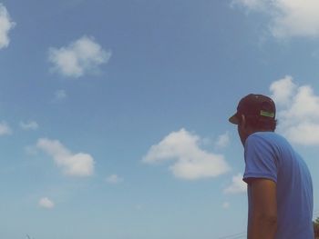 Low angle view of man against sky