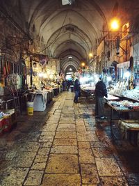 People in market at night