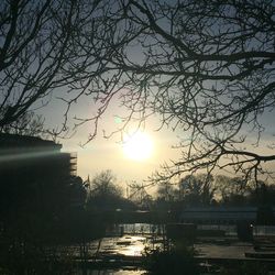 Scenic view of river at sunset