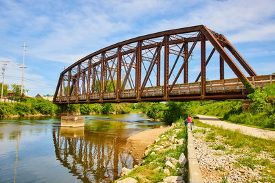 Bridge over river against sky