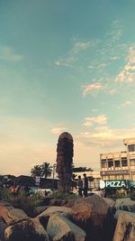 Old building against sky during sunset