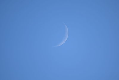 Low angle view of moon in sky