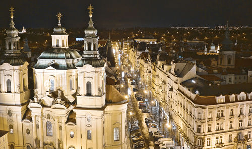 Illuminated buildings in city at night