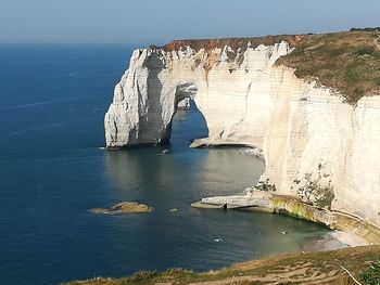 View of rock formations in sea