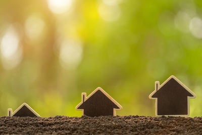 Close-up of small house against sky