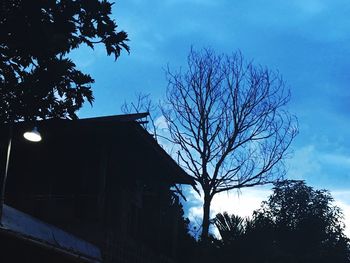 Low angle view of building against blue sky