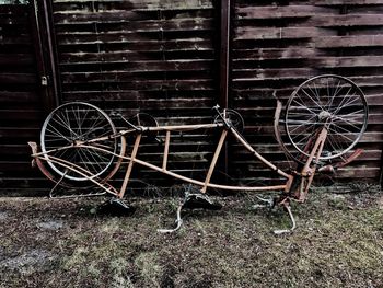 Abandoned motorcycle on wood