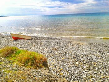 Scenic view of beach against sky