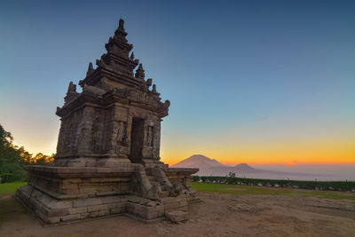 View of temple against sky during sunset