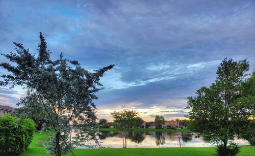 Scenic view of lake against sky during sunset