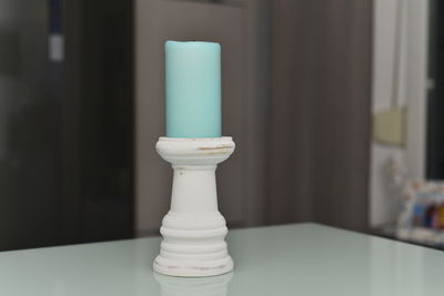 Close-up of chess pieces on table at home