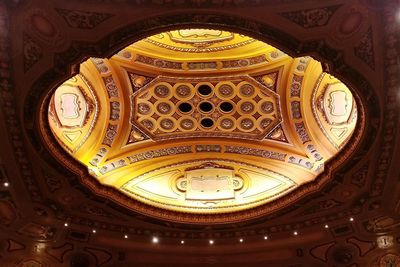 Low angle view of illuminated ceiling in building