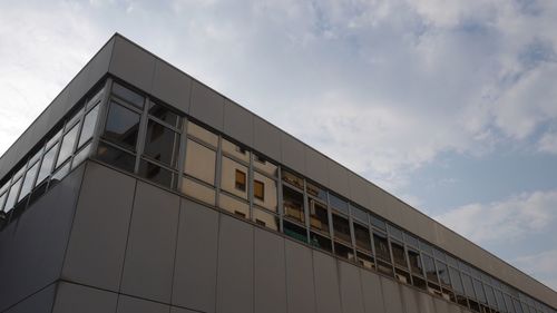 Low angle view of modern building against sky