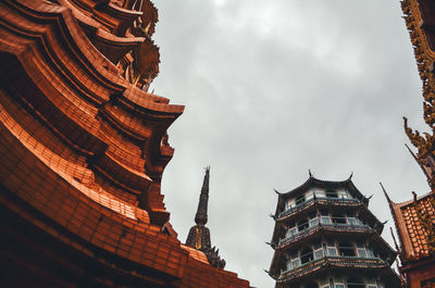 Low angle view of temple building against sky