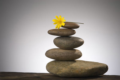 Close-up of stack of flower on table