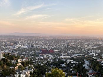 High angle view of townscape against sky during sunset