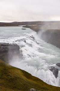 Scenic view of gulfoss waterfall against sky