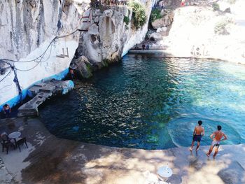 High angle view of people by lagoon