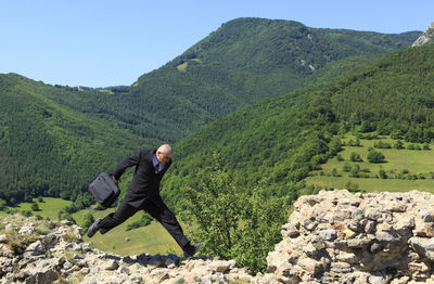 Side view of man on mountain