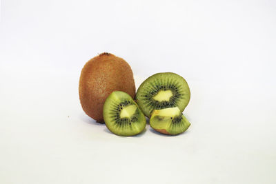 Close-up of fruits against white background