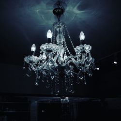 Low angle view of illuminated chandelier