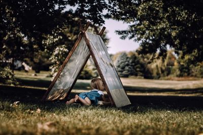 Boy playing on grass