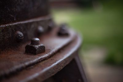 Close-up view of rusty wheel
