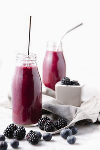 Close-up of drink in glass jar on table