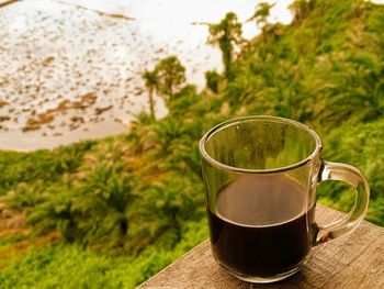 Close-up of indonesian black coffee on table