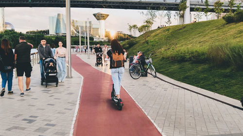 People on bicycle in city