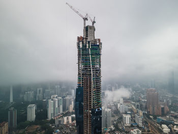 Modern buildings in city against sky