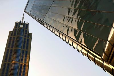 Low angle view of skyscrapers against sky