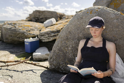 Woman reading outdoors