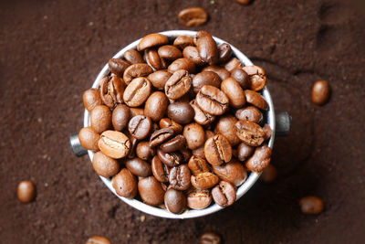 High angle view of coffee beans in bowl