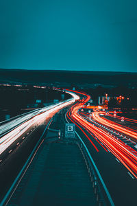 High angle view of light trails on road