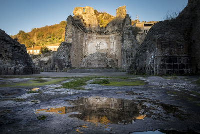 View of old ruin building against sky