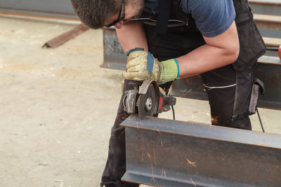 Man working on metal