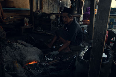 People working on log