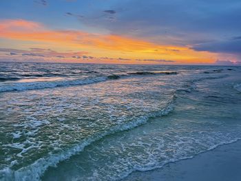 Scenic view of sea against sky during sunset