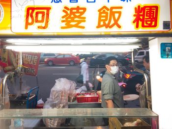 Man at market stall