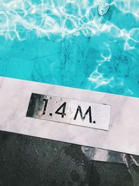 High angle view of text on swimming pool