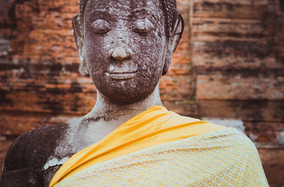 Close-up portrait of buddha statue