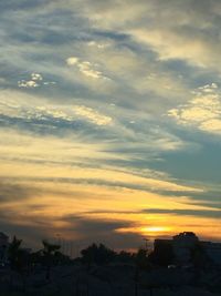 Scenic view of cloudy sky at sunset