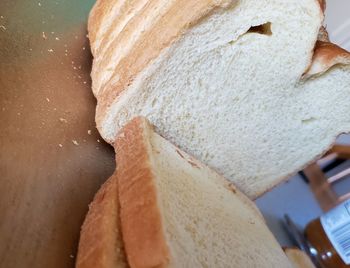 High angle view of bread on cutting board