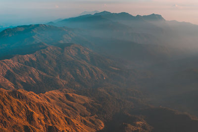 Scenic view of mountains against sky during sunset