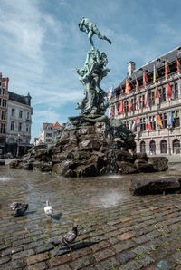 Statue of historic building against sky