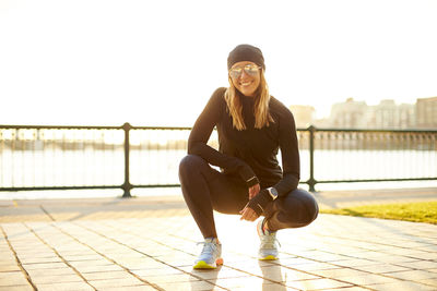 Outdoor portrait of an athletic woman.