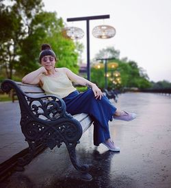 Portrait of woman sitting outdoors