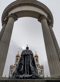 Statue of tsar alexander ii against cathedral of christ the savior